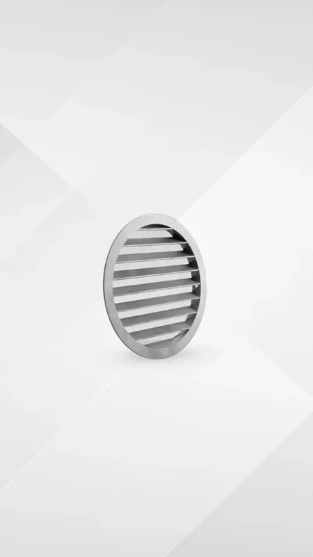 Grille extérieure aluminium à ventelles anti-pluie et anti-volatiles